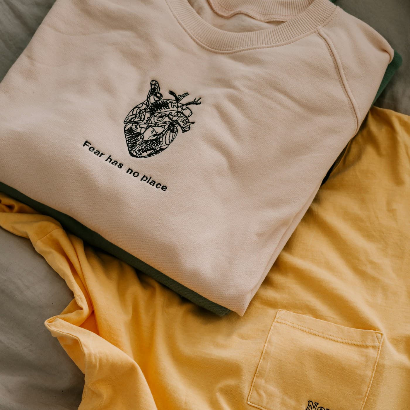 Printed tee with an embroidered graphic design